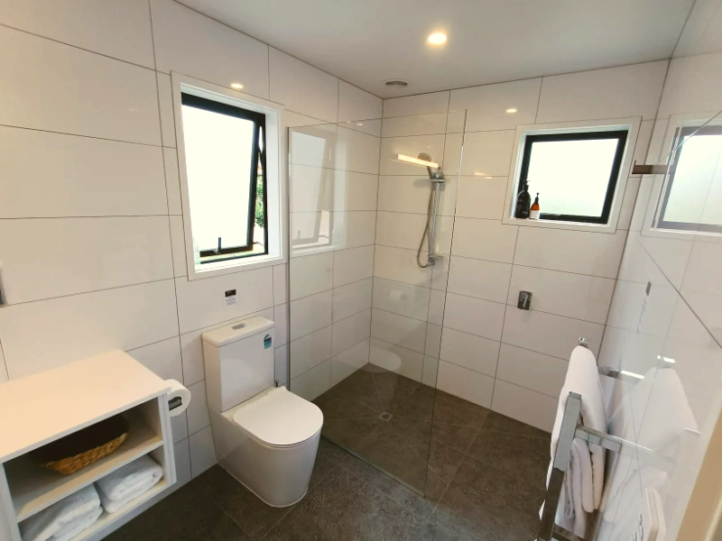 Luxury tiled bathroom in private studio, Kerigold Chalets Kerikeri