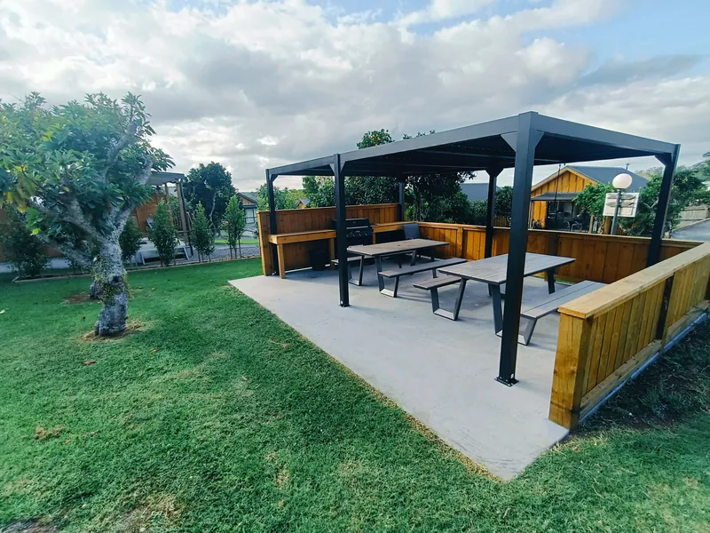 Orchard setting and outdoor amenities at Kerigold Chalets