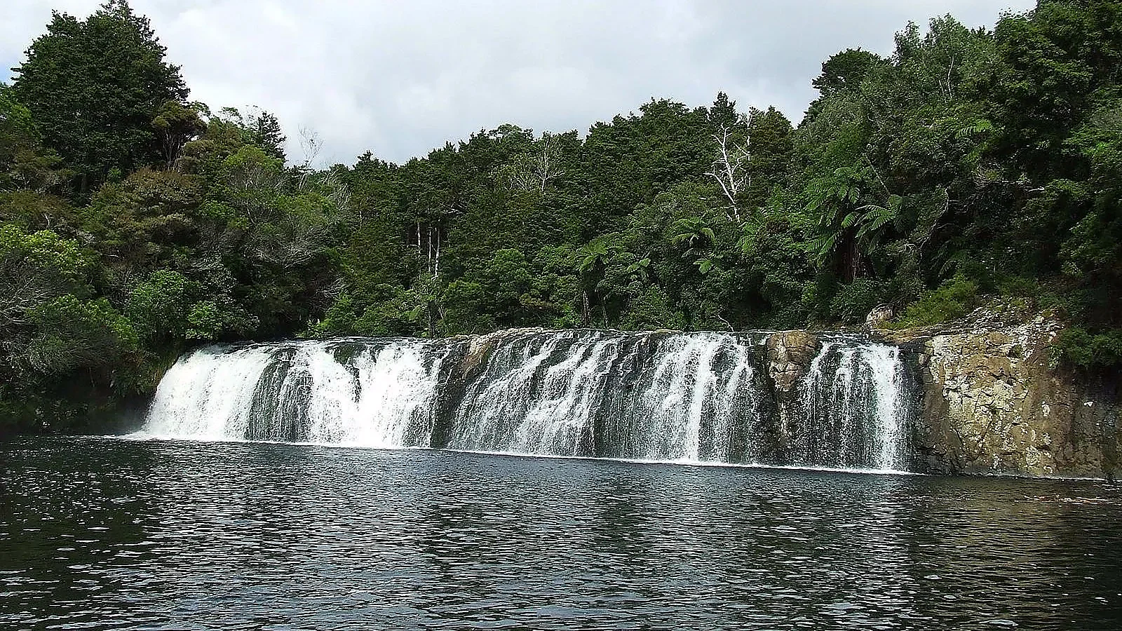 Wharepuke Falls Kerikeri cascading through lush subtropical garden